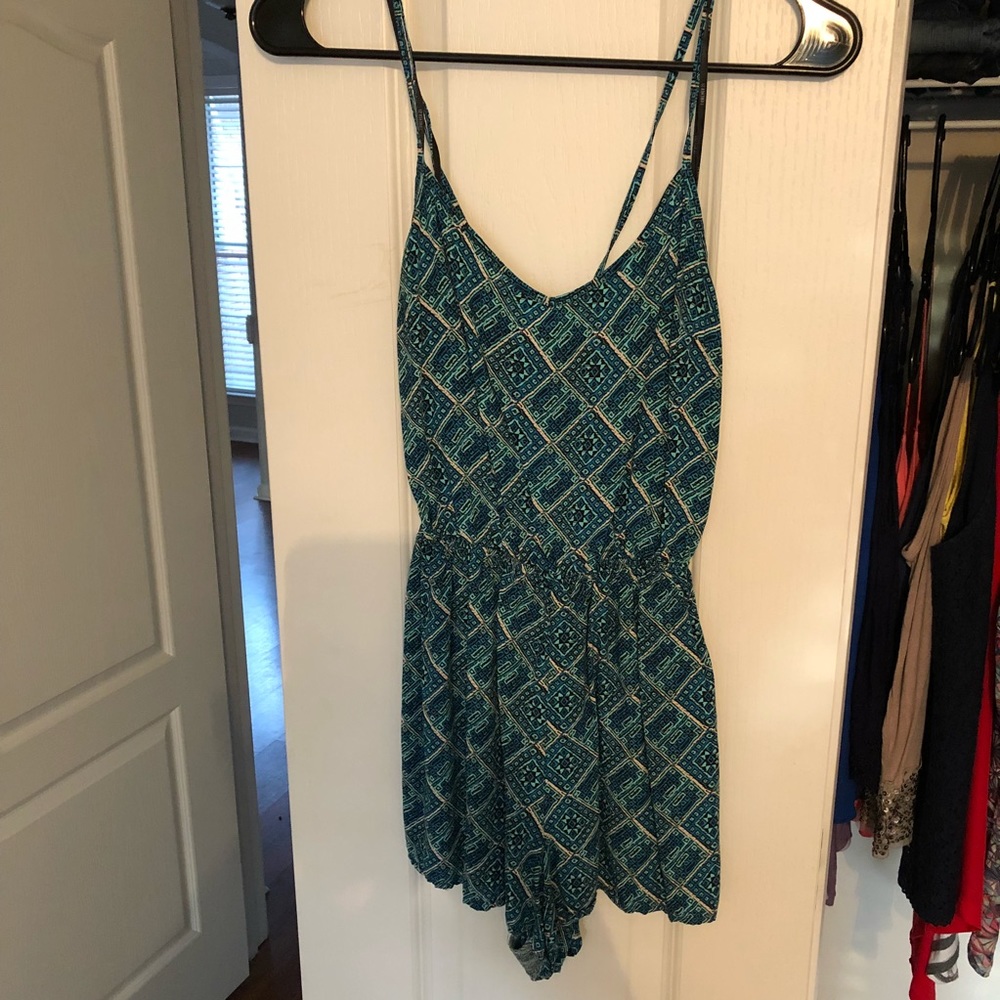 Tribal print romper with open back!